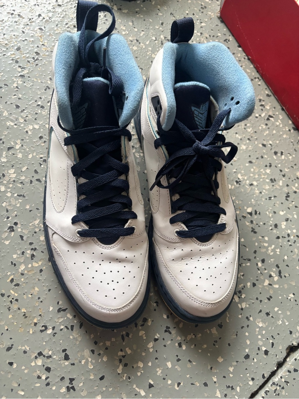 Jordan White High-Top Sneakers with Navy and Light Blue Accents